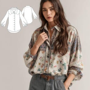 May include: A white button-down shirt with a floral print and a relaxed fit. The shirt has long sleeves with a gathered detail at the shoulders and a slightly rounded hem.