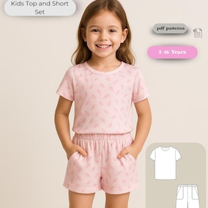 May include: A light pink kids' top and shorts set with a repeating leaf pattern. The set includes a short-sleeved t-shirt and shorts with pockets. The text "Kids Top and Short Set" is displayed above the child. The set is designed for ages 2-16 years.