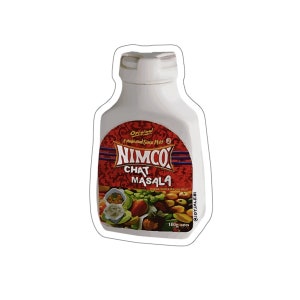 May include: A white plastic bottle of Nimco Chat Masala, a red and white label with the text "Original Established Since 1947" and "Nimco Chat Masala" with a picture of a fruit salad. The bottle is 100 grams.