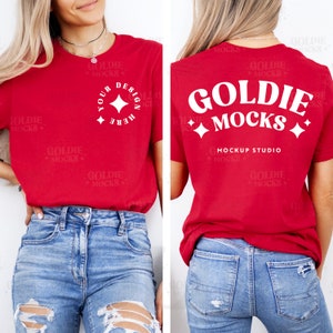 May include: Red t-shirt with white text and a diamond design. The front of the shirt has the text "YOUR DESIGN HERE" in a circle. The back of the shirt says "GOLDIE MOCKS MOCKUP STUDIO". The model is wearing blue jeans.