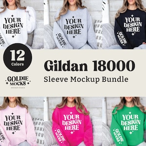 May include: Mockup of 12 different coloured Gildan 18000 sweatshirts with the text "Your Design Here" on the front and "Goldie Mocks" on the sleeves.