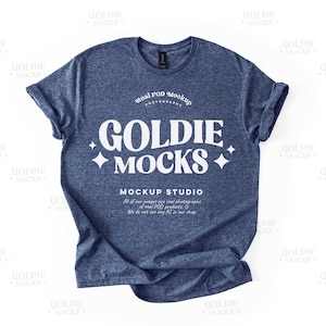 May include: A blue heather t-shirt mockup with the text "Goldie Mocks" and "Real POD Mockup" printed on the front. The text is white and the shirt is crumpled.