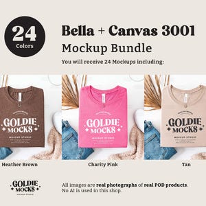 May include: A mockup bundle of 24 Bella + Canvas 3001 t-shirts in three colors: heather brown, charity pink, and tan. Each shirt features a logo with the text "Goldie Mocks" and "Mockup Studio".