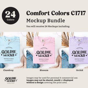 May include: A mockup bundle of 24 t-shirt designs featuring a variety of colors, including Chambray, Blossom, and Orchid. The t-shirts are folded and laid out on a white surface with a wooden background. The text "Comfort Colors C1717 Mockup Bundle" is displayed at the top of the image. The text "You will receive 24 Mockups including:" is displayed below the title. The text "GOLDIE MOCKS MOCKUP STUDIO" is displayed on each t-shirt.