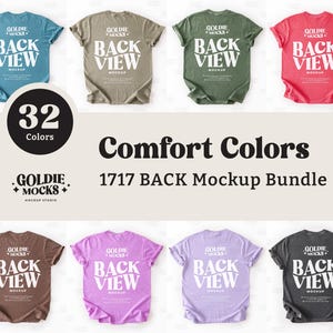以下が含まれることがあります： 「GOLDIE MOCKS」と「BACK VIEW」の文字が背面に印刷された、32色の異なるTシャツのモックアップバンドル。テキストはレトロなフォントスタイルです。Tシャツは白い表面に置かれています。Comfort Colors 1717 Back Mockup Bundle.