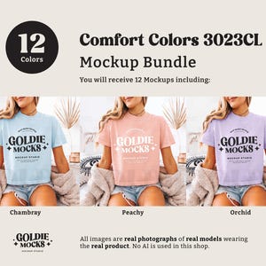 May include: Three women wearing different coloured t-shirts with the text "Goldie Mocks" and a logo. The t-shirts are in Chambray, Peachy, and Orchid colours. The text "Comfort Colors 3023CL Mockup Bundle" is at the top of the image.