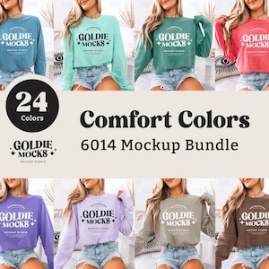 以下が含まれることがあります： 長袖シャツの24色の異なるモックアップバンドル。シャツはクロップドスタイルで、「GOLDIE + MOCKS + MOCKUP STUDIO」のテキストが特徴です。