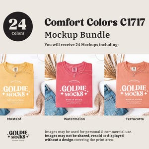 May include: A mockup bundle of 24 t-shirts in various colors, including mustard, watermelon, and terracotta. The t-shirts are folded and laid out on a white surface with a light brown fuzzy surface and blue denim fabric. The t-shirts feature the text "Goldie Mocks" in a white font.