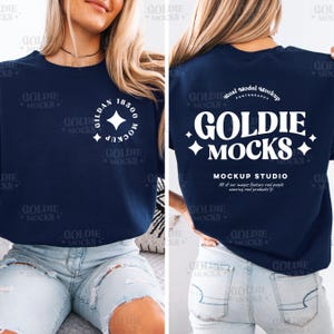 May include: Navy blue Gildan 18500 sweatshirt mockup. The front features a white circular logo with text, and the back displays "GOLDIE MOCKS" in a bold, white font. The mockup studio text is also visible.
