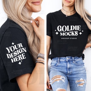May include: A black t-shirt mockup with the text "Goldie Mocks Mockup Studio" and a white star design. The text "Your Design Here" is on the sleeve of the shirt.