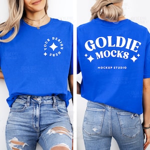 May include: A royal blue t-shirt with short sleeves and a white design on the front that says "Your Design Here" with a star. The back of the shirt has a white design that says "Goldie Mocks" with stars and "Mockup Studio".