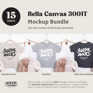 May include: A mockup bundle featuring three t-shirts in different colors: Heather Dust, Heather, and Dark Grey Heather. Each shirt displays the text "GOLDIE MOCKS MOCKUP STUDIO". The image also includes the text "15 Colors" and "Bella Canvas 3001T Mockup Bundle".