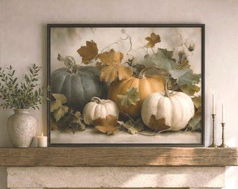 May include: A living room featuring a fireplace with a framed painting of pumpkins and autumn leaves above it. Two beige armchairs with patterned pillows flank a round wooden coffee table holding a ceramic vase, a candle, and books.