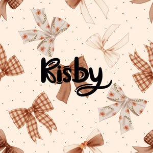 May include: A seamless pattern featuring brown and white bows with floral accents on a cream background with brown polka dots. The text "Kisby" is written in black cursive.