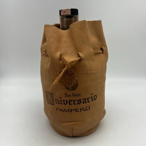 Vintage 1963 Ron Anejo 25th Anniversary Empty Rum Bottle Inside a Leather Bucket Pouch