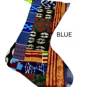 May include: A blue, red, yellow, and green patterned Christmas stocking with a green ribbon.