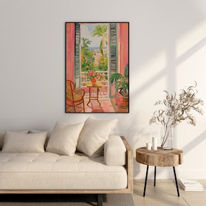 May include: A painting of a window with pink curtains and green shutters, looking out onto a balcony with a table and chair. The balcony overlooks a city with palm trees and a blue sky.
