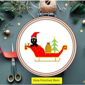 Schema punto croce "Gatto di Natale sulla slitta di Babbo Natale": disegno natalizio per principianti (PDF digitale)