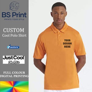 May include: A bright orange polo shirt with short sleeves and a button-up collar. The shirt has the text "YOUR DESIGN HERE" printed on the right side of the chest.