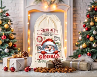 May include: A cream-colored Christmas gift sack with the text "NORTH POLE OVERNIGHT SERVICE SPECIAL FOR:" and the name "GEORGE". The sack features a Santa Claus graphic and is decorated with red and green accents. Christmas trees and gifts are in the background.
