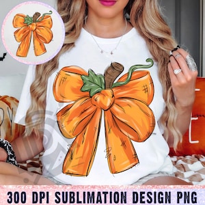 May include: White t-shirt featuring a large orange bow design with a stem and green leaf. The bow has a sketched appearance with crosshatch details. A smaller circular version of the bow is in the upper left. The text "300 DPI SUBLIMATION DESIGN PNG" is at the bottom.