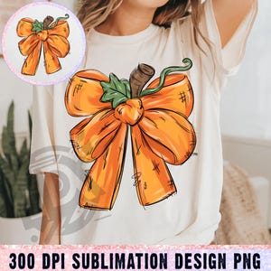 May include: A cream-coloured t-shirt with a large orange bow design, complete with a pumpkin stem and leaves. The bow has a sketched look with shading and cross-hatching. The text "300 DPI SUBLIMATION DESIGN PNG" is at the bottom.