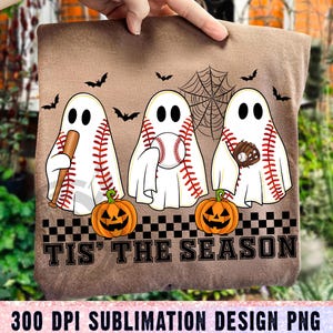 May include: Brown fabric with a Halloween-themed design. Features three baseball-themed ghosts, bats, a spiderweb, and jack-o'-lanterns. The text "TIS' THE SEASON" is displayed below the ghosts. The design is labeled as a 300 DPI sublimation design PNG.
