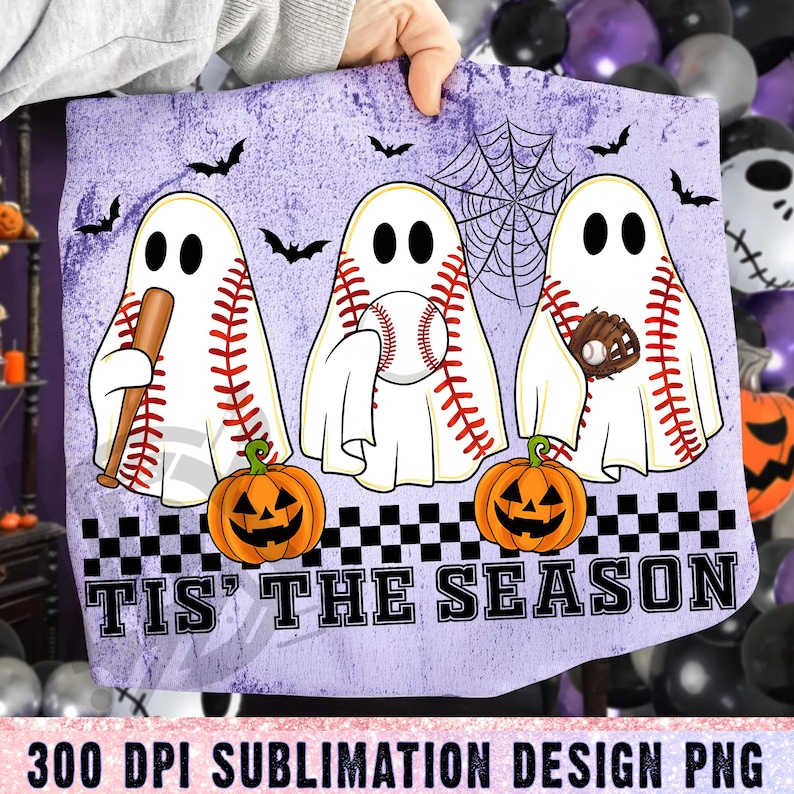 May include: A light purple Halloween-themed design featuring three baseball-shaped ghosts with baseball bats, balls, and gloves. The ghosts are positioned above orange jack-o'-lanterns, with bats and a spiderweb in the background. The text "TIS' THE SEASON" is displayed at the bottom.