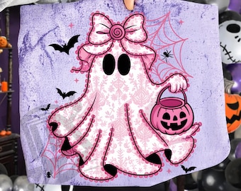 May include: A Halloween-themed design featuring a ghost with a pink bow, holding a jack-o'-lantern bucket. The ghost has a floral pattern and is surrounded by bats, spiders, and a spiderweb on a purple background. The text "300 DPI SUBLIMATION DESIGN PNG" is at the bottom.