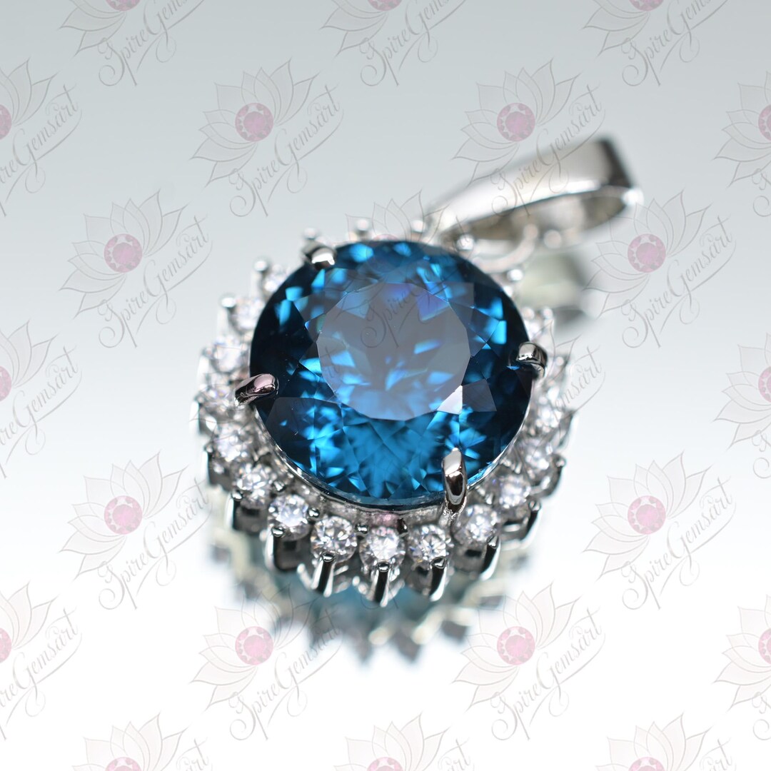 23カラットの天然ブルーインディコライトトルマリンラウンドハロー