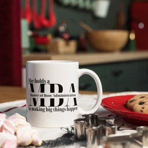 She holds a Master of Boss Administration in Making Big Things Happen Coffee Mug