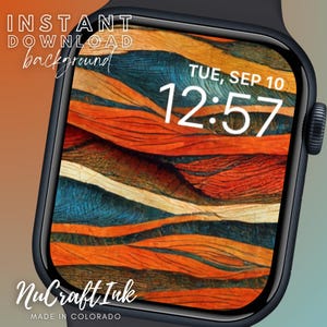May include: A digital watch face with an abstract design in shades of orange, blue, and brown. The watch face displays the date and time: TUE, SEP 10 12:57. The watch face is labeled "NuCraft Ink MADE IN COLORADO".