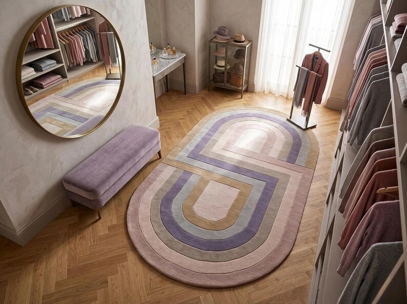 Dressing nook with round mirror and modern oval area rug, purple oval rug adds retro geometric warmth