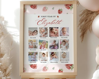Peut inclure: Un chevalet en bois présente une affiche de jalons pour bébé personnalisée. L'affiche, ornée de fraises, affiche "First Year of Elizabeth" et des photos de un à douze mois. Le fond comprend des ballons et des herbes de la pampa.