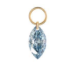 May include: A gold pendant featuring a light blue, marquise-cut gemstone. The gemstone is faceted, catching the light. The pendant hangs from a small, circular gold loop.