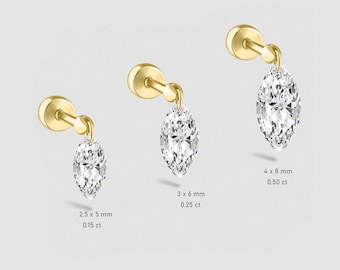 Op de afbeelding: Drie gouden oorringen met een hangende ovale diamant. De oorringen worden getoond in toenemende grootte van links naar rechts. De kleinste oorring is 2,5 x 5 mm en 0,15 ct, de middelste oorring is 3 x 6 mm en 0,25 ct, en de grootste oorring is 4 x 8 mm en 0,50 ct.