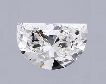 May include: A brilliant-cut, half-moon shaped diamond. The gemstone is clear and colorless, with many facets that reflect light. The diamond is set against a light gray background, showcasing its sparkle and clarity. This diamond is ideal for jewelry.