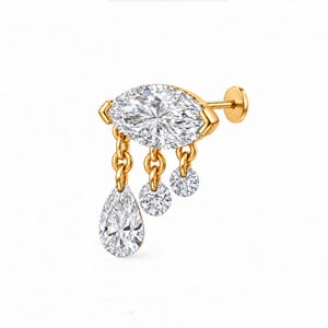 May include: A gold stud earring featuring a central marquise-cut clear stone in a gold setting. Three short gold chains hang from the base, each ending in a clear stone: one large pear-cut stone and two smaller round-cut stones, with a flat back post.