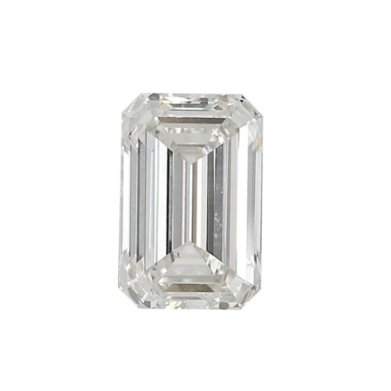 May include: A clear, emerald-cut diamond. The rectangular gemstone features step-cut facets, reflecting light. The diamond has a high degree of clarity and brilliance. The gemstone is set against a white background.