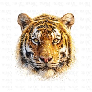 May include: A detailed illustration of a tiger's face, featuring a blend of orange, brown, and black stripes. The tiger's eyes are a striking yellow-green, and the image is accented with gold glitter. The background is white.