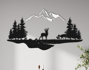 May include: Black metal wall art depicting a mountain scene with trees, deer, and a lake. The artwork is mounted on a light gray wall above a black console table and chair. The room is decorated with a rug, candles, and vases.
