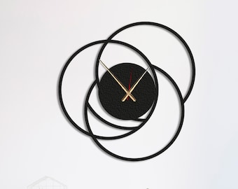 Reloj de pared circular de metal negro: Arte silencioso minimalista moderno
