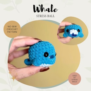 May include: A blue crocheted whale stress ball with black eyes and a white belly. The image includes the text "Whale Stress Ball" and "No Sew Crochet Pattern". The whale uses 1.8" stress balls.