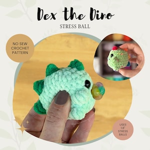 May include: A green crocheted dinosaur stress ball with black eyes. The dinosaur is being squeezed in a hand. The text "Dex the Dino" and "Stress Ball" is at the top of the image. The text "No Sew Crochet Pattern" is in the top left corner. The text "Uses 1.8" Stress Balls" is in the bottom right corner.