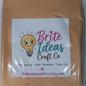 May include: A rectangular block of light tan air-dry foam clay sealed in a clear plastic bag. A white label on the front features a yellow lightbulb illustration and the text Brite Ideas Craft Co. with a list of supplies and a website URL.