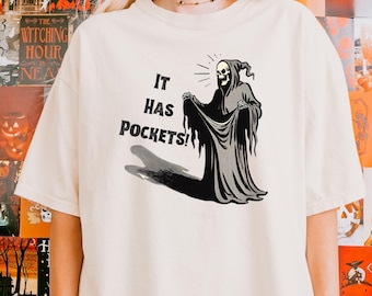 Camiseta divertida de Halloween, tiene bolsillos, camiseta de la Parca, regalo de temporada espeluznante, camiseta de meme de moda, camiseta gótica vintage, regalos góticos, ropa de otoño
