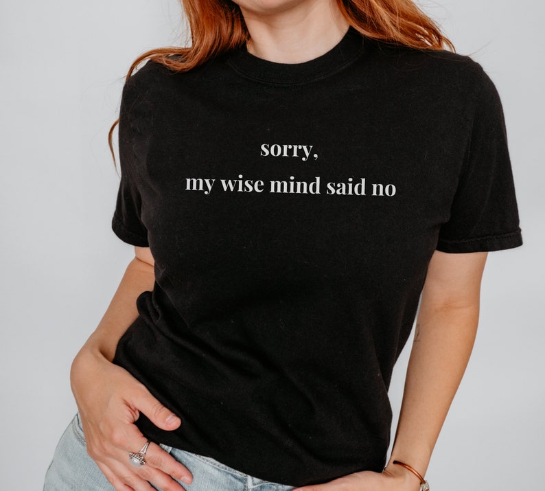 May include: Black t-shirt with white text that reads "sorry, my wise mind said no".