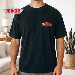 embroidered black comfort colors t-shirt with mcqueen car