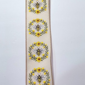 2,5-inch bij met zonnebloemlint: geel, groen, zwart, wit, beige