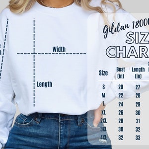 Op de afbeelding: Witte Gildan 18000 sweatshirt maattabel met metingen in inches voor borst, lengte en mouwlengte. Maten vari&euml;ren van S tot 4XL.